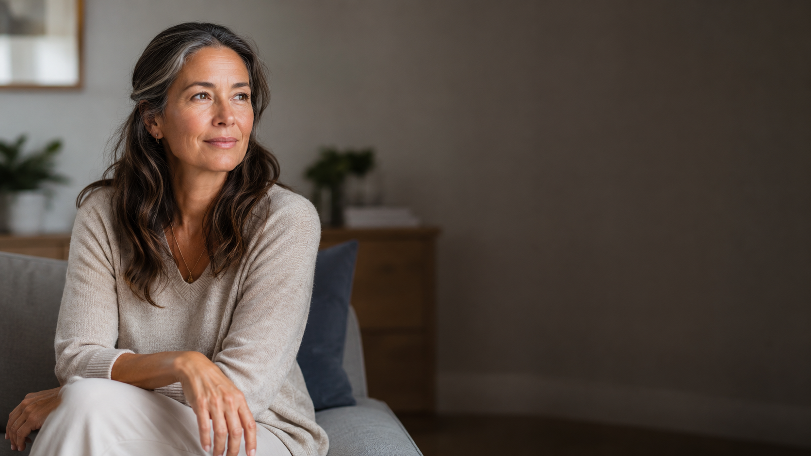 Woman at home, calm and reflective